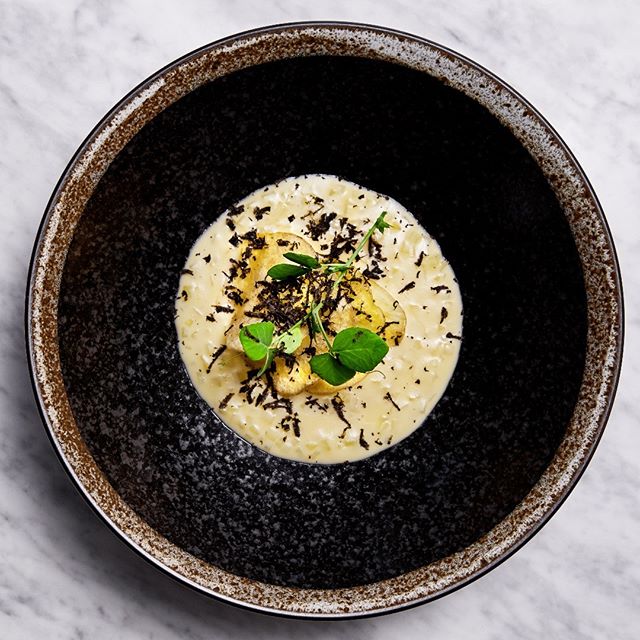 . Monday night dinner plans ? “RISOTTO” 
Celeriac. Potato. Parsley. Smoke. Truffle.
Our version of "risotto", made with potato & celeriac instead of traditional rice. Parsley pesto, truffle butter & fresh truffle, black pepper & grana padano. 📸 @andreavdspuy . . . . . . #capetownrestaurants #capetownfoodie #capetown #riverinerabbit #capetownsouthafrica #capetowndinner